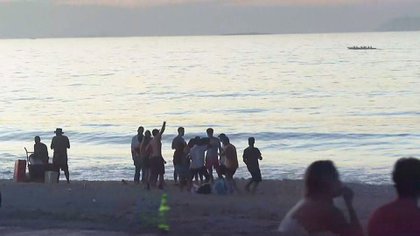 Grupos de personas en las playas de Río